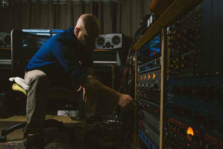 Chris Schmelzer with ADAM S3X-H active midfield monitors working on the outboard