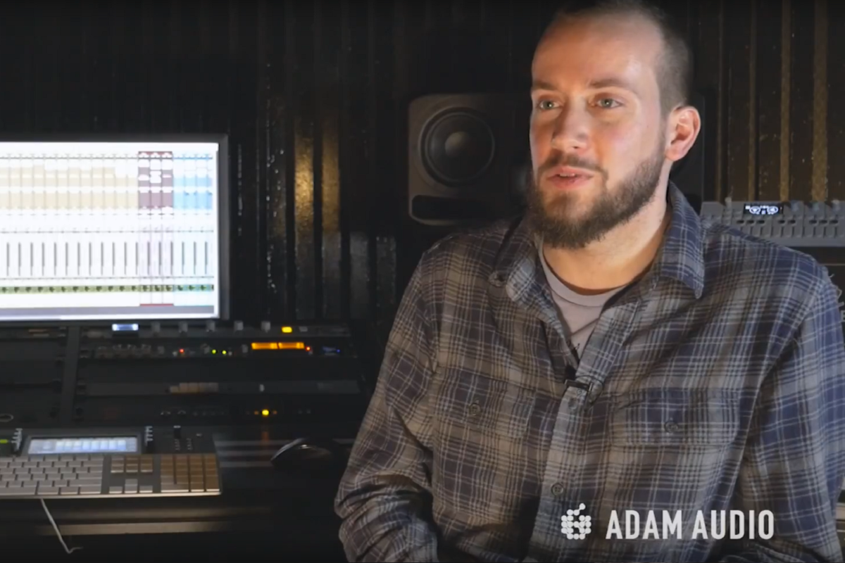 Producer Aaron Bastinelli in his studio with ADAM Audio S3H studio monitors
